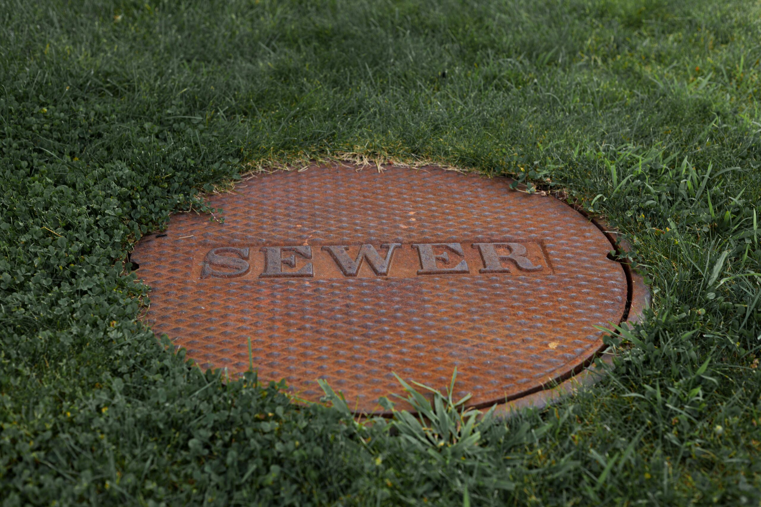 clearing a clogged sewer line