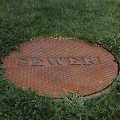 clearing a clogged sewer line